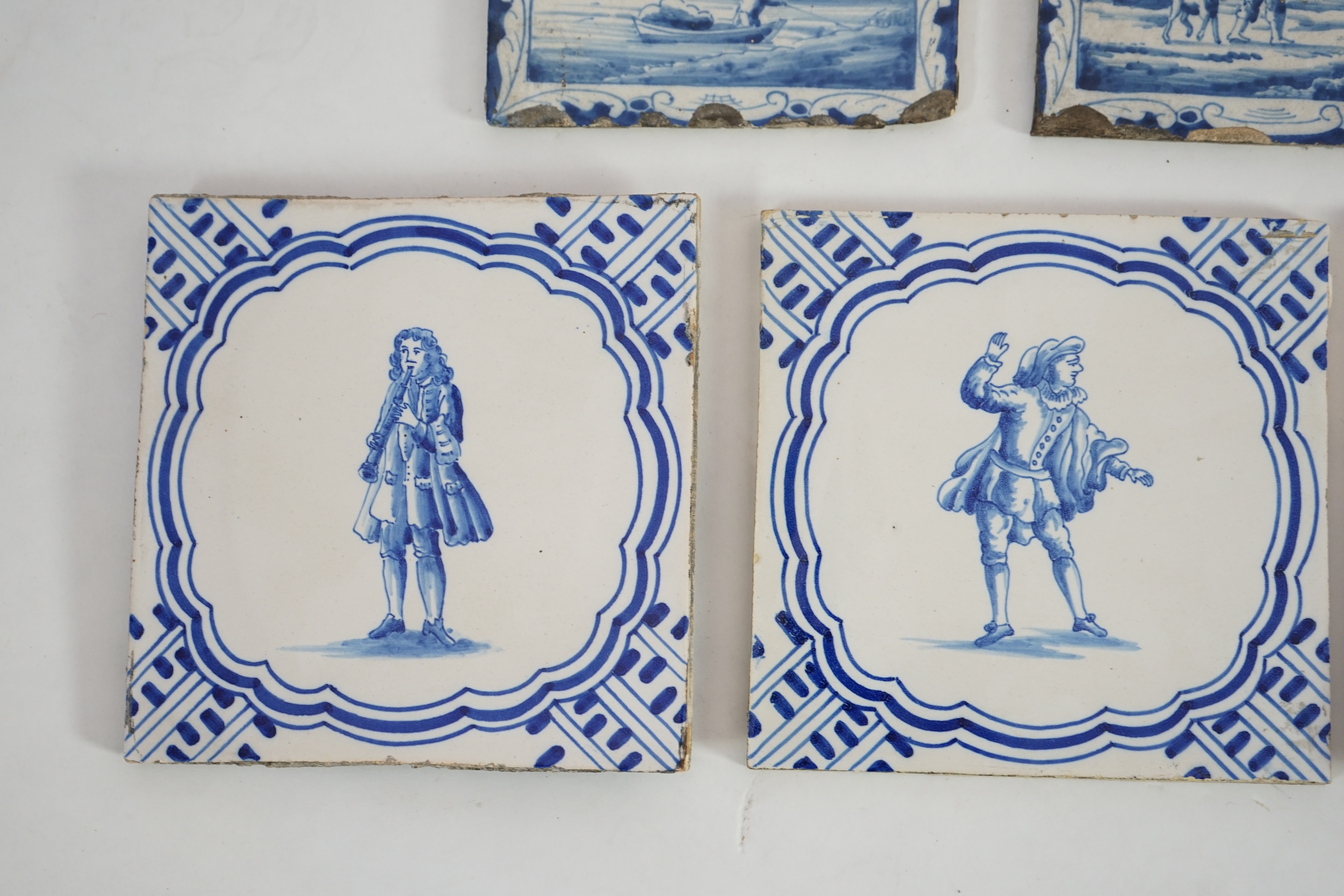 A pair of 18th century Delft blue and white tiles